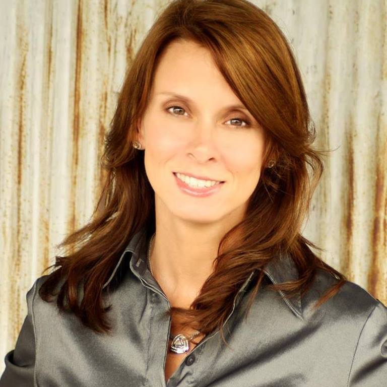 Amanda Bell/Broker Owner At Home Realty Team